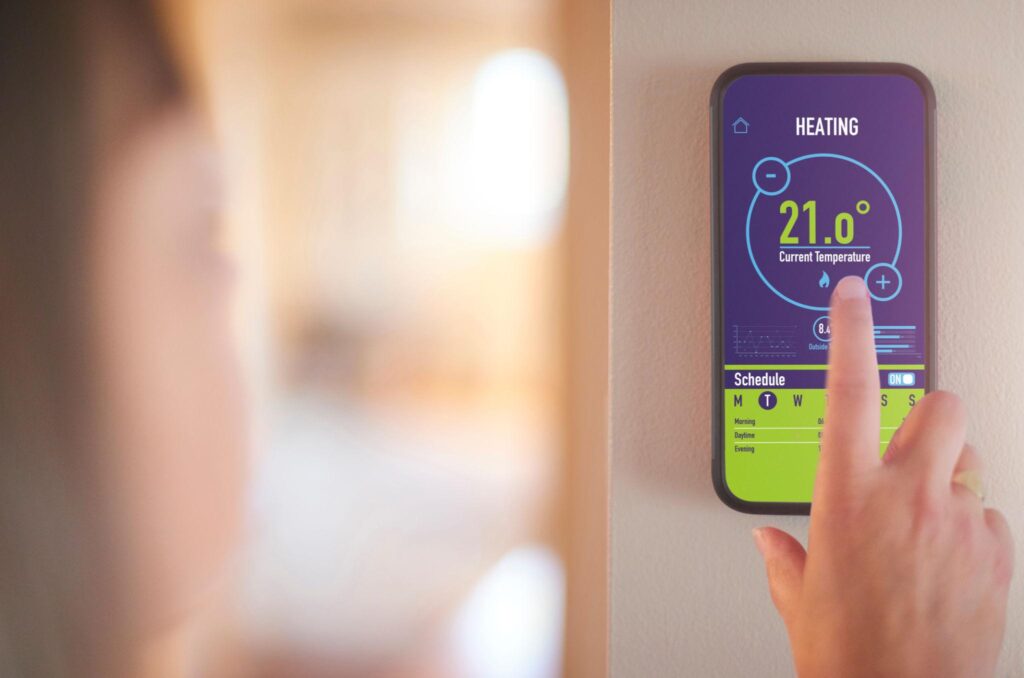 Smart thermostat reducing heating and cooling expenses